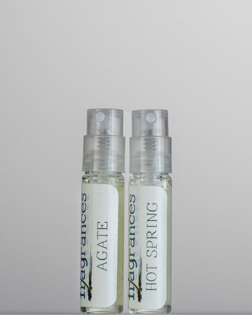 Sound Fragrances 2 ml perfume samples Agate and Hot Spring standing on a grey background