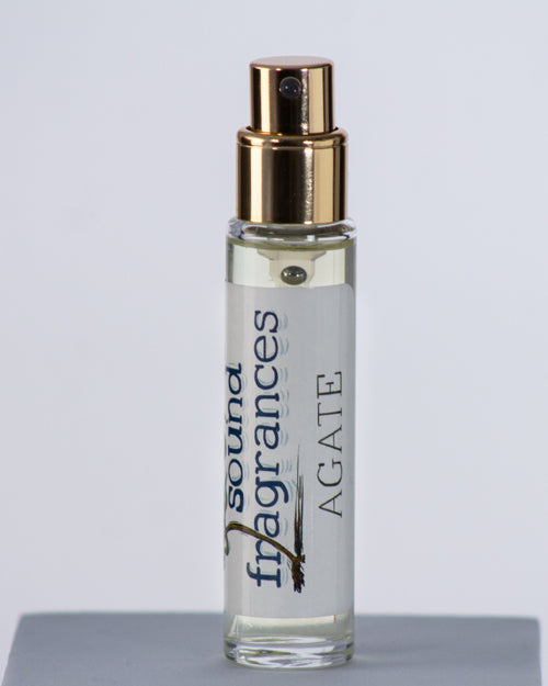 Agate perfume by Sound Fragrances, cold beach inspired Eau de Parfum travel bottle on gray background — artisan fragrance from the Pacific Northwest.