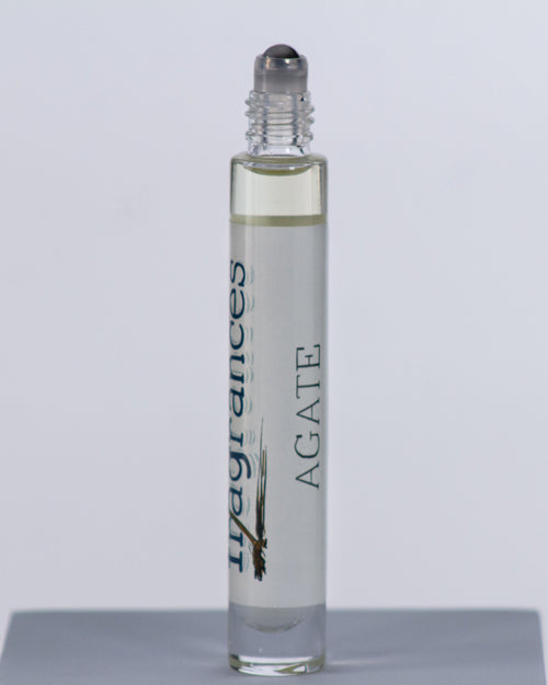 Agate perfume by Sound Fragrances, cold beach inspired Eau de Parfum travel roller bottle on gray background — artisan fragrance from the Pacific Northwest.