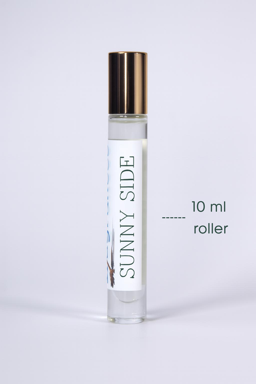 Travel-size rollerball bottle of Sound Fragrances Sunny Side eau de parfum, inspired by high deserts