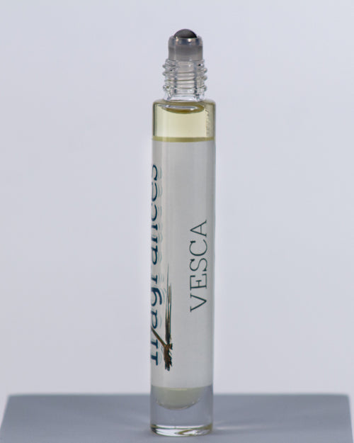 Vesca perfume by Sound Fragrances, berry inspired Eau de Parfum travel bottle on gray background with — artisan fragrance from the Pacific Northwest.
